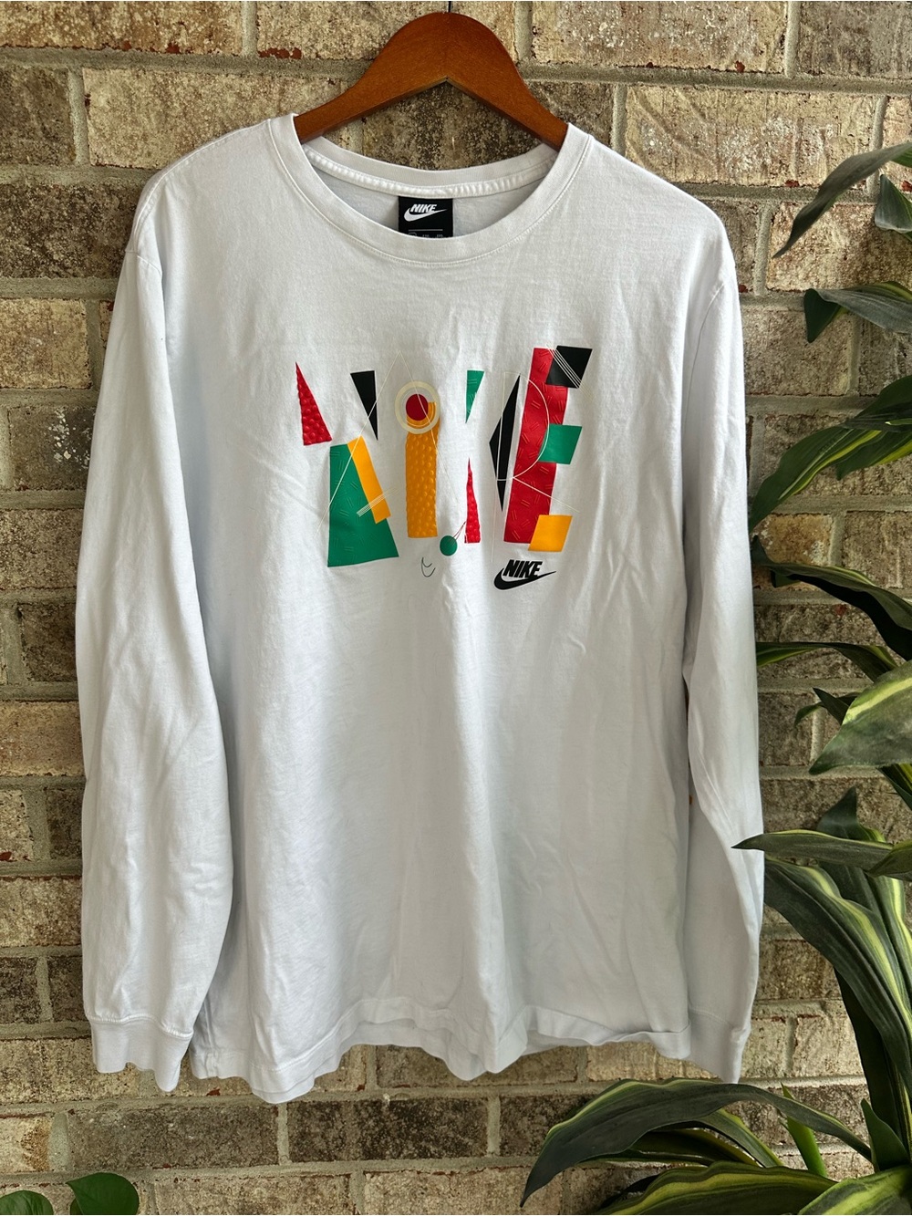 Nike White Long Sleeve Tee with Multicolor Geometric Print